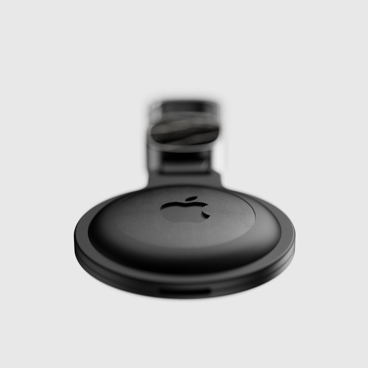 AirTag Hülle aus Nero Marquina Marmor mit weißen Adern, Rückseite mit eingesetztem AirTag