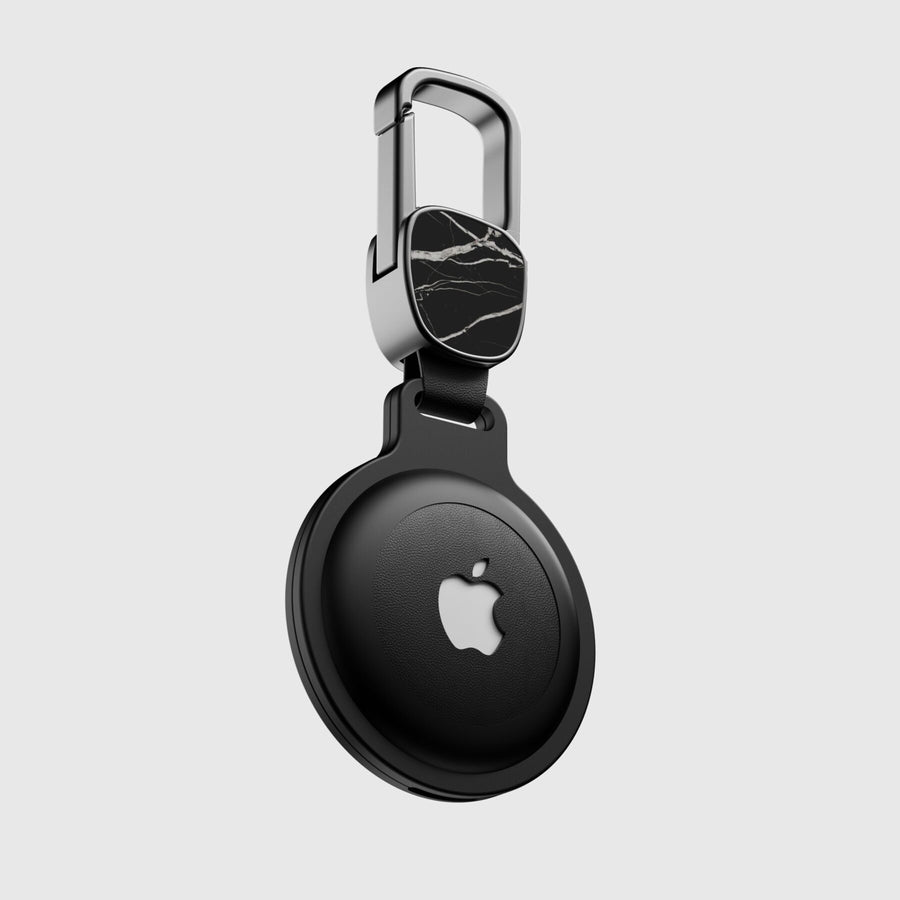 AirTag case in Nero Marquina marble with white veins, with carabiner, seen from the front