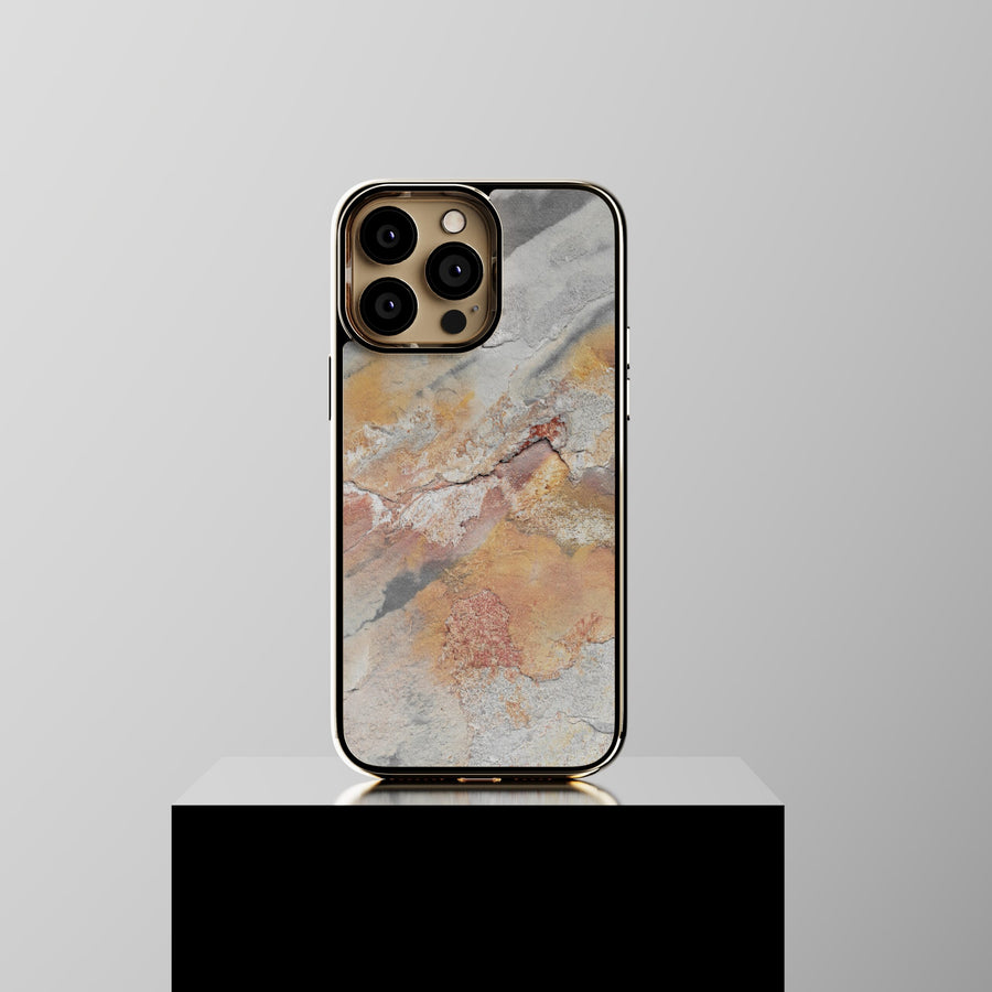 iPhone case in Indian Summer slate in warm autumn tones, standing on a light pedestal