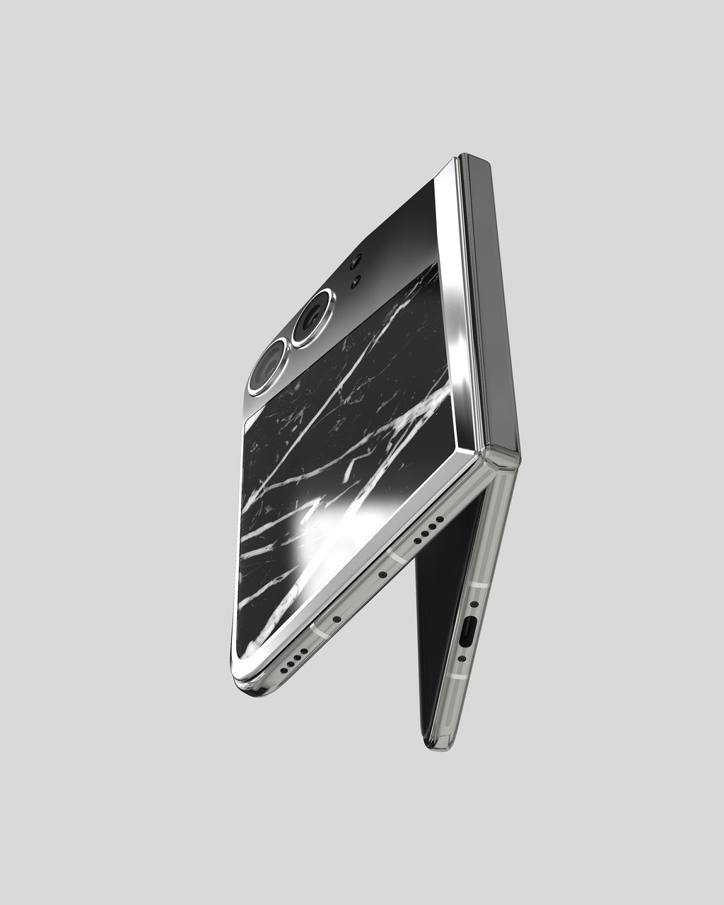Marble Fusion Snap Nero Marquina on the half-open iPhone Duo, seen from below