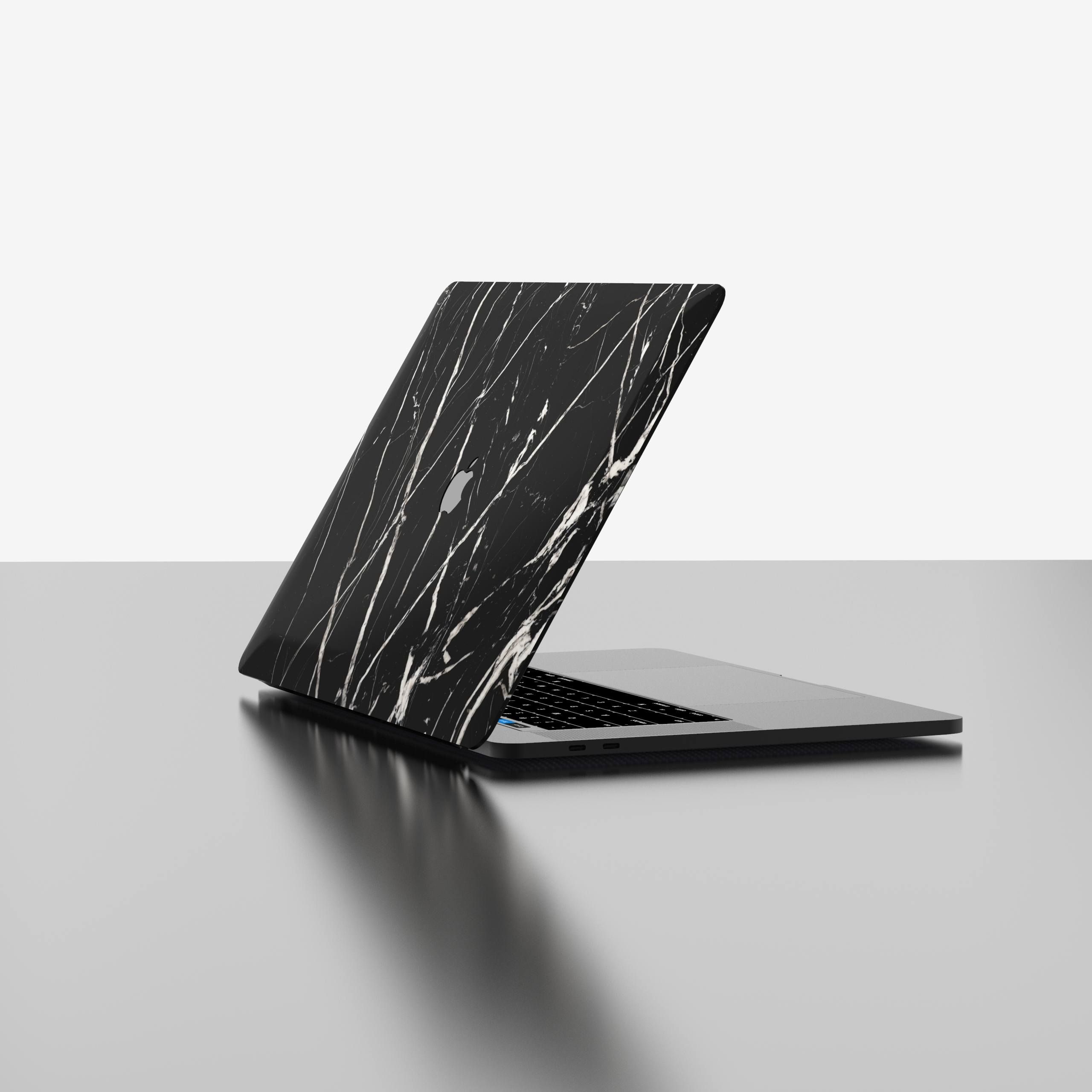 The Marble MacBook Skin Nero Marquina The Marble MacBook Skin Nero Marquina
